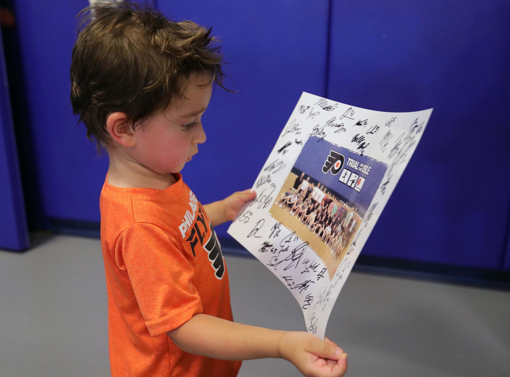 Philadelphia Flyers prospects sign autographs and play volleyball